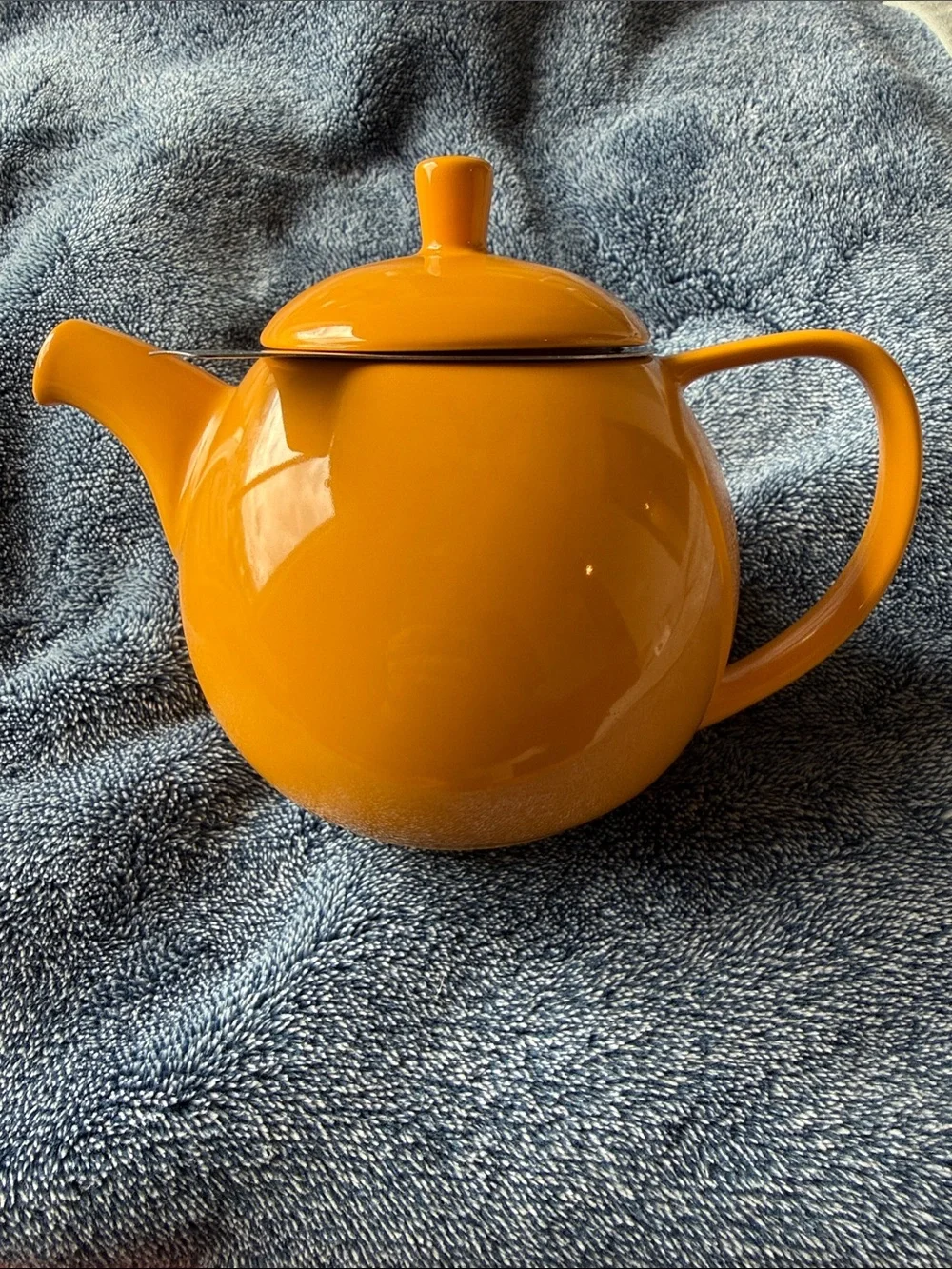 Bright Orange Ceramic Teapot with Round Silhouette